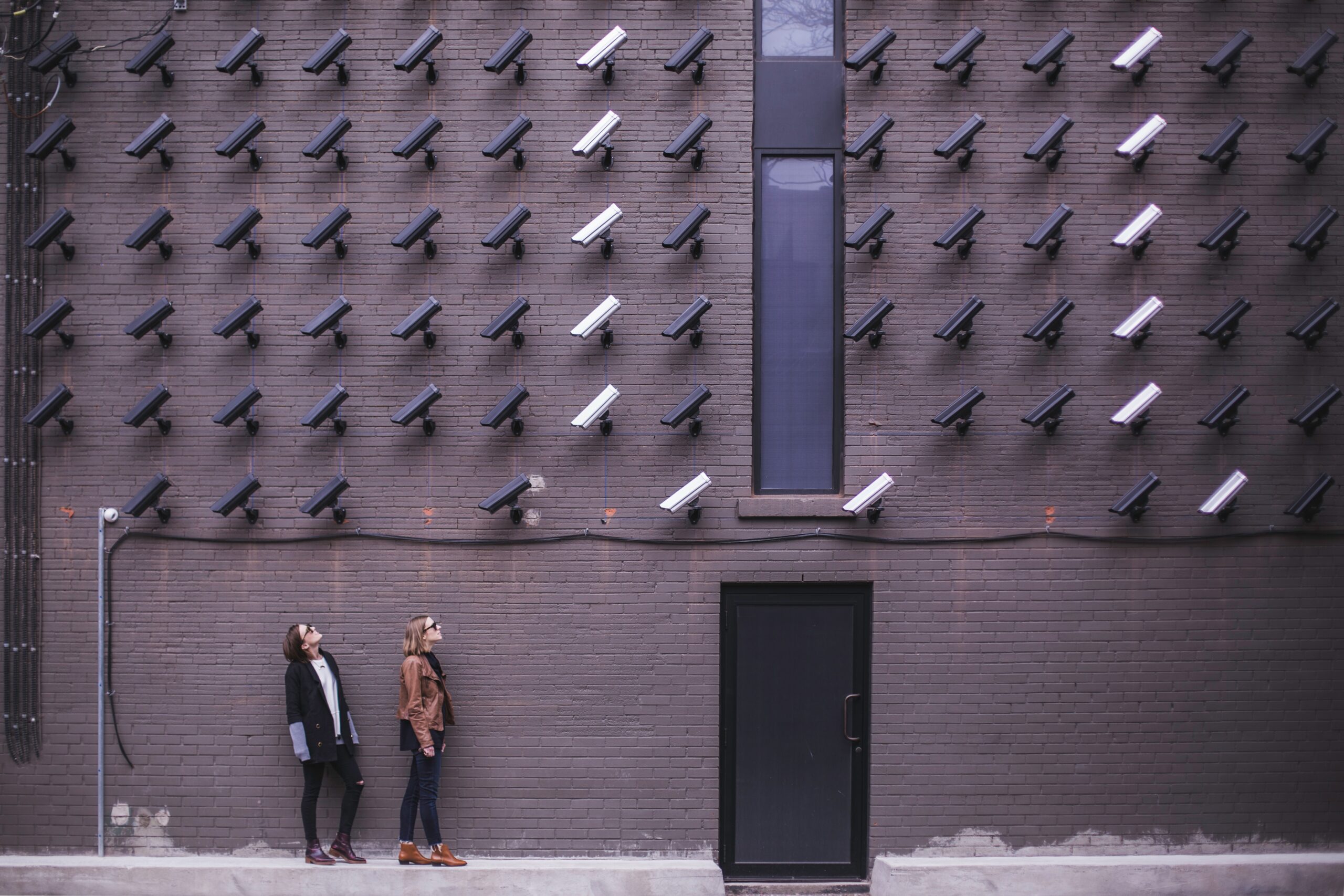A wall of CCTV Cameras monitoring a subject(s)